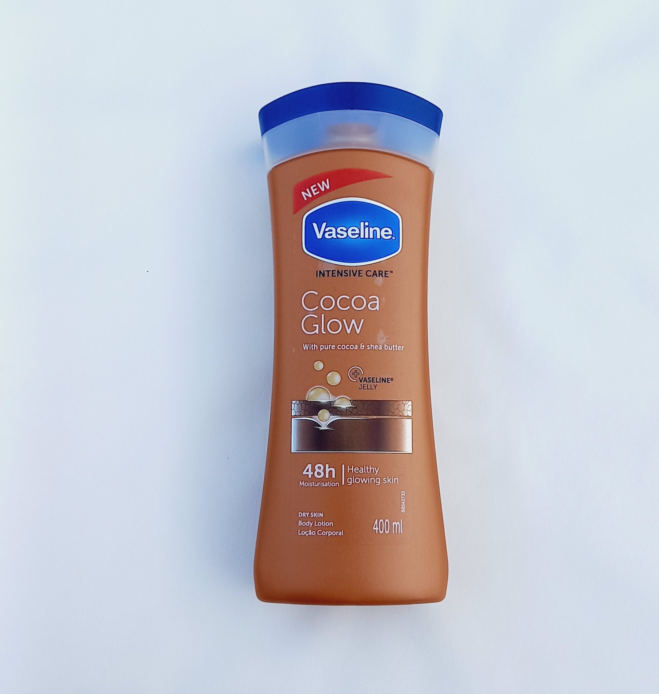 لوسیون بدن وازلین مدل Cocoa Glow